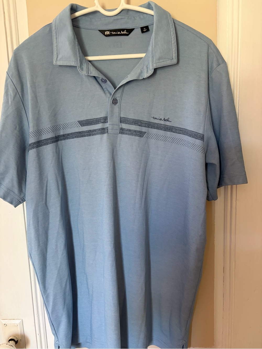 Travis Mathew Men's Light Blue Polo with Subtle Chest Stripe